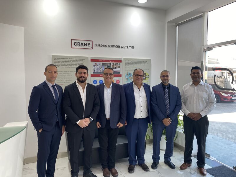 Omega and Crane teams at Crane Building Services & Utilities in Dubai